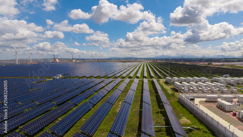 Large Scale Solar Farm With Wind Turbines And Energy Storage Systems