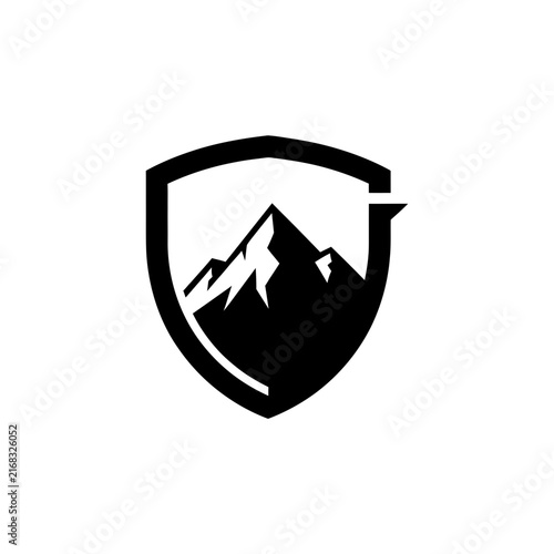 Mountain peak inside shield emblem