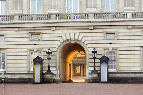 Photography Buckingham Palace archway entrance with royal sentry boxes in London
