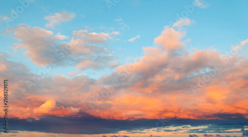 Photography Panoramic cloudscape background with orange and red clouds in the sunset sky, pi