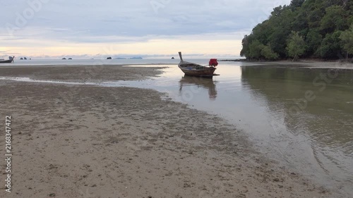 Traditional Thai sea boats at low tide on the Andaman Sea
