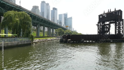 New York City Riverside Park South Manhattan United States. Modern residential building Upper West Side. Urban skyscraper skyline. Miller highway remnant, elevated viaduct. Industrial gantry dock pier