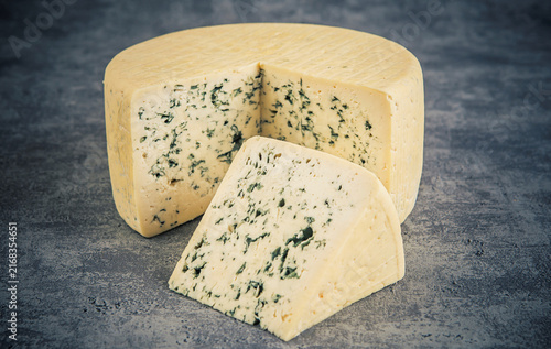 Bild auf Leinwand Cheese collection, French blue cheese made from cow milk close up