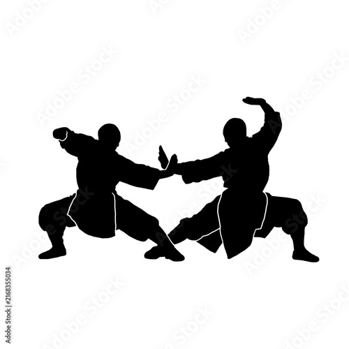 Canvastavla silhouette of 2 kungfu fighter in fight stance ready to fight