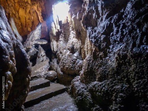 Canvas Print Majestic underground cave formations display intricate limestone stalactites and
