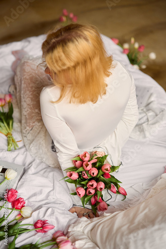 Serene image capturing delicate lace and tulip bouquet details