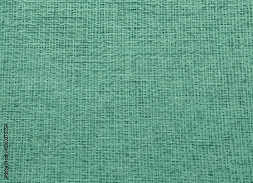 Foto Teal green woven fabric background pattern texture