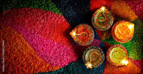 Diwali Diya Lamps With Colorful Rangoli - Indian Hindu Festival of Lights