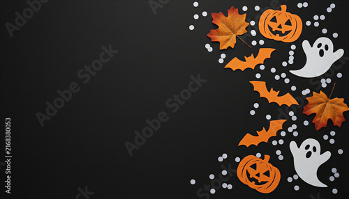 Halloween background with pumpkins ghosts bats and maple leaves