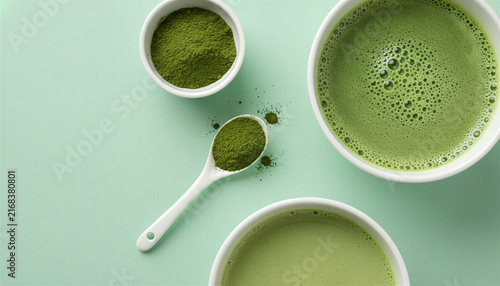 Matcha green tea and powder on a light green background