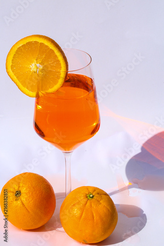 Aperol Spritz with Fresh Orange Slice on White Background