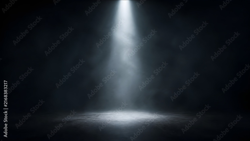 Fototapeta premium Dramatic single overhead spotlight illuminating a grungy concrete floor with swirling smoke in a dark, empty stage or performance space.
