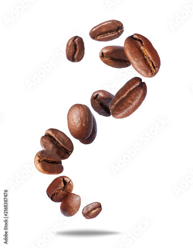 Foto Falling roasted coffee beans in the air close-up isolated on a transparent backg