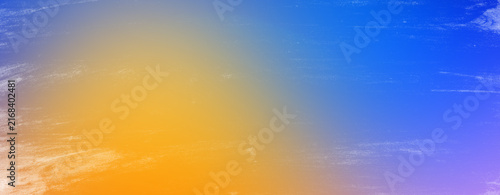 Obraz na plátně Warm dynamic gradient background shifting from azure blue to luminous orange and yellow with scratched overlay finish tailored for contemporary web headers banners and print media