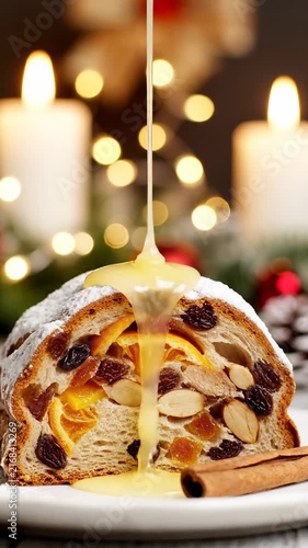 Traditional German Christmas Fruit Bread Stollen Served with Creamy Vanilla Sauce for Festive Holiday Season Celebration