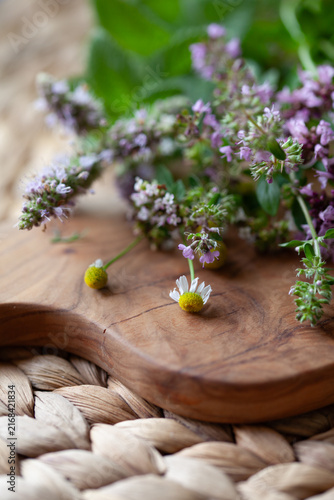 Fresh garden medicinal herbs -  collected for the healthy tea, include mint, chamomile, origanum, thyme, yarrow, melissa, lemon balm and St. John's wort.