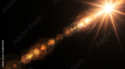 Optical Lens Flare and Bright Sunburst Light Overlay on Pure Black Background