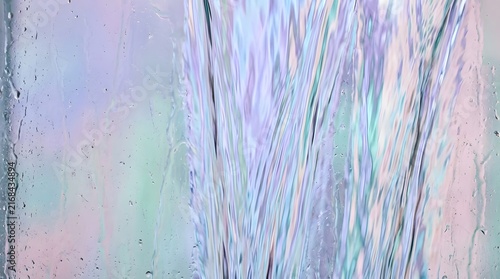 Abstract flowing water texture with iridescent light reflections