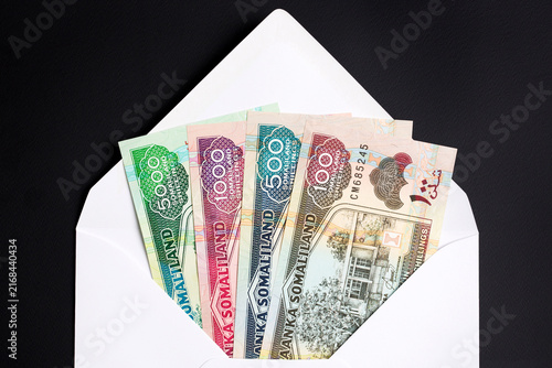 Somaliland Schillings in a white envelope