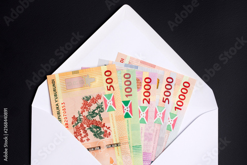 Burundian franc in a white envelope