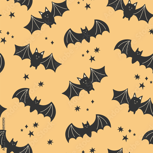 Halloween seamless pattern. Cute bats on a yellow background. Repeating vector print for wrapping, textile, decoration. Halloween party. Fall holiday illustration.
