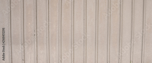 Obraz na plátně A cream painted board and batten wood siding wall surface in a horizontal orient