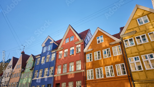 Facade of traditional colorful houses in the center of Copenhagen in Denmark.