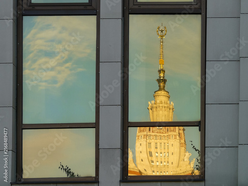 Distorted reflection of the Moscow State University Main Building in a window, Moscow, Russia