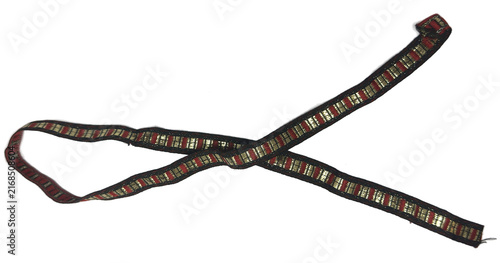 Crossed narrow ethnic pattern woven tape strip on transparent background
