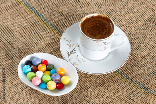 Cuadro en lienzo Turkish coffee and colorful chocolate candies