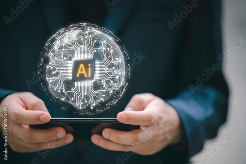 Close-up of businessman using laptop with floating AI command prompt and icons, representing artificial intelligence, prompt engineering, generative technology for digital transformation.