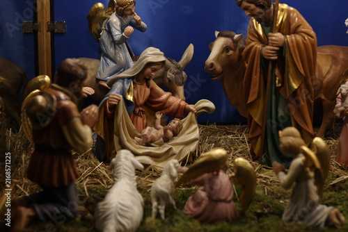 Cuadro en lienzo Traditional Christmas nativity scene featuring baby Jesus, Mary, Joseph, angels, shepherds and animals in a Bethlehem stable