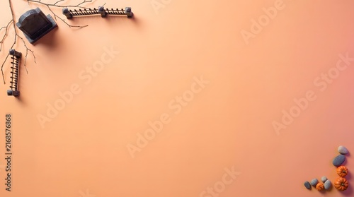 Minimalist flat lay background with dried flowers and leaves on a soft peach colored surface