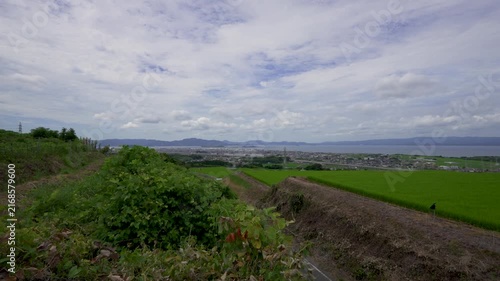 Timelapse Panoramic View of Rice Fields and Omura City Bay in Nagasaki, Japan