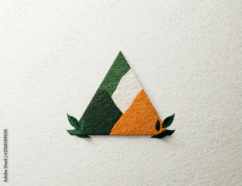 Obraz na płótnie Abstract triangle with textured layers and subtle leaf accents