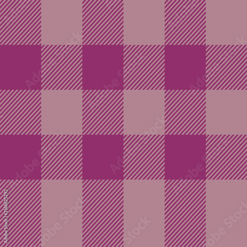 Seamless vector buffalo plaid check pattern in a classic woven jacquard style. Vintage-inspired geometric tartan print featuring diagonal twill texture in rich autumn shade palette of deep magenta