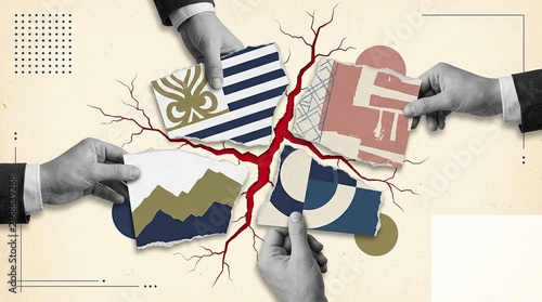 Hands holding torn fragments of abstract flags symbolizing global negotiation challenges.