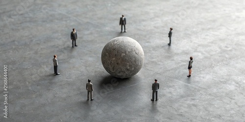 Business Team Standing Around a Large Sphere on Concrete Floor – Leadership, Strategy and Teamwork Concept