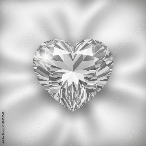Exquisite Heart-Shaped Diamond Gemstone with Brilliant Facets Sparkling on a Soft White Fabric Background
