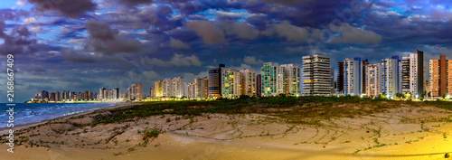 Canvas Print Luxury oceanfront skyscraper at dusk in the city of Sao Luis, Maranhao