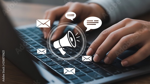 Digital marketing communication concept with laptop and social media messaging icons