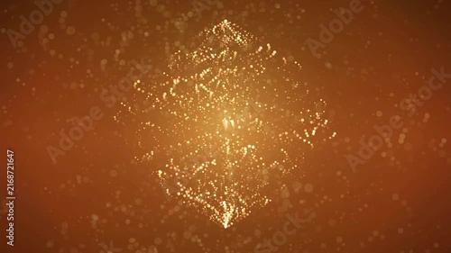 Abstract golden sparkling particles forming a floating diamond shape on a dark brown background