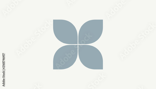 Elegant minimalist flower logo composed of four grey petal shapes arranged symmetrically on a light background.