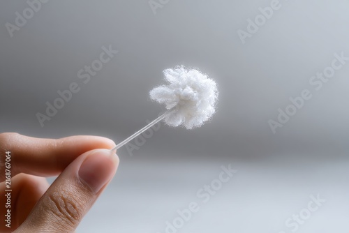 DNA. concept of genetic testing process. Close-up of human hand holding cotton swab with soft cotton. cheek swab DNA collection