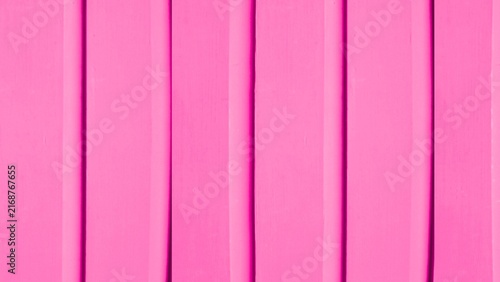 Vibrant pink wooden planks for background and exterior wall design