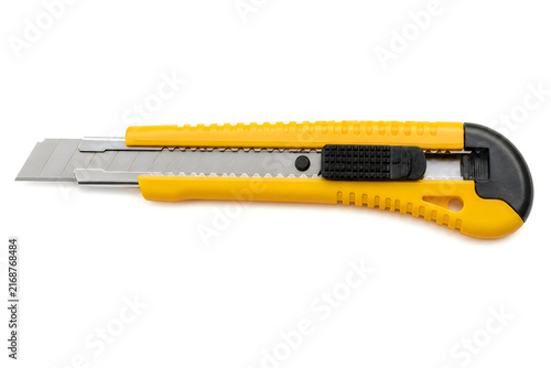 Retractable utility knife yellow body for precision cutting.