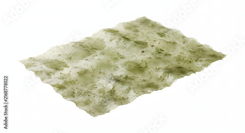 Handmade mulberry paper sheet with embedded green pressed leaves isolated on white background.