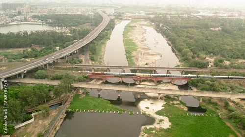 Aerial view of expressway and railway bridges over Yamuna river in New Delhi India