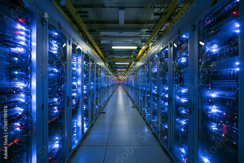 Modern Data Center Corridor with Glowing Server Racks