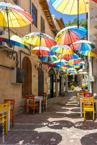 Colorful turkish village alley. The scene represents leisure travel, street culture, hospitality, and destination discovery, now